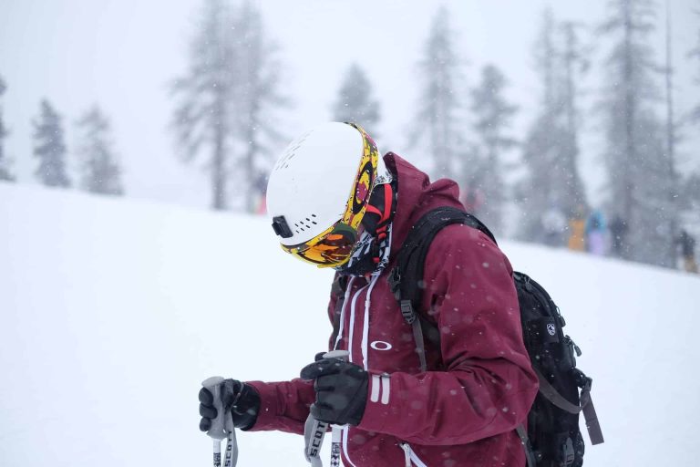 skier with gloves