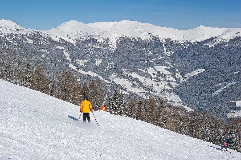 ski-in-yellow-jacket