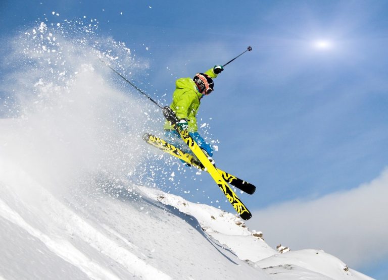 Ski in Green Jacket