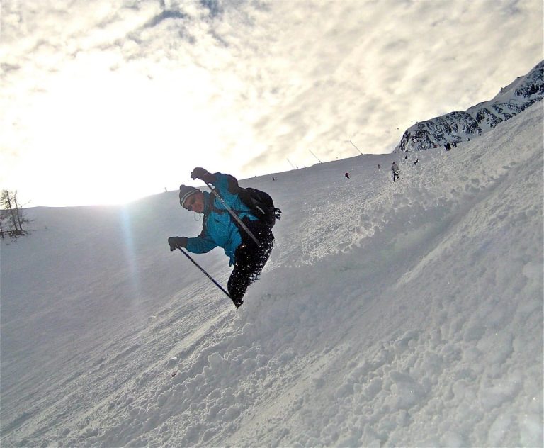 Skier in Blue Jacket