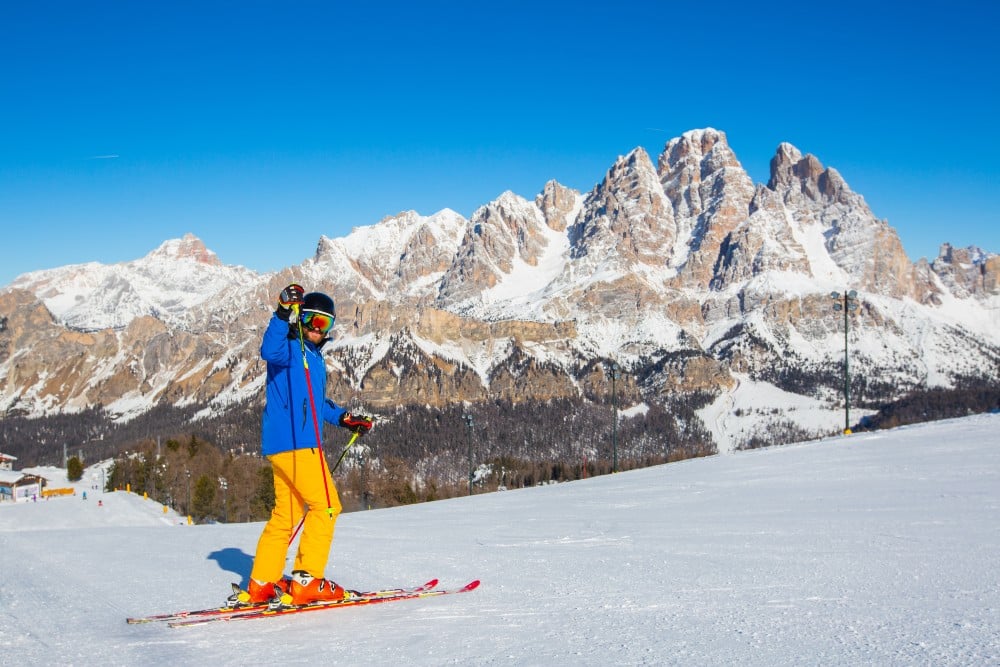 skier in yellow pants