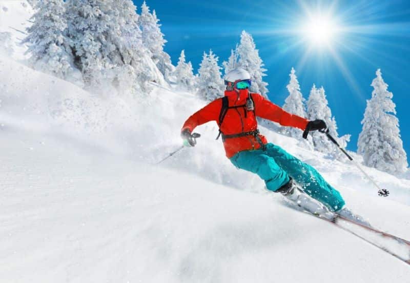 skier skiing downhill